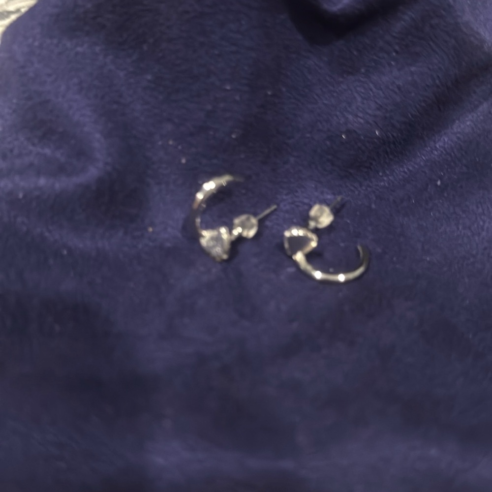 Silver earrings with little hearts